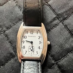 Authentic Tiffany watch gently worn. Leather band. Needs battery.